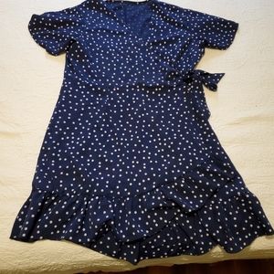 Polka dot navy wrap dress
